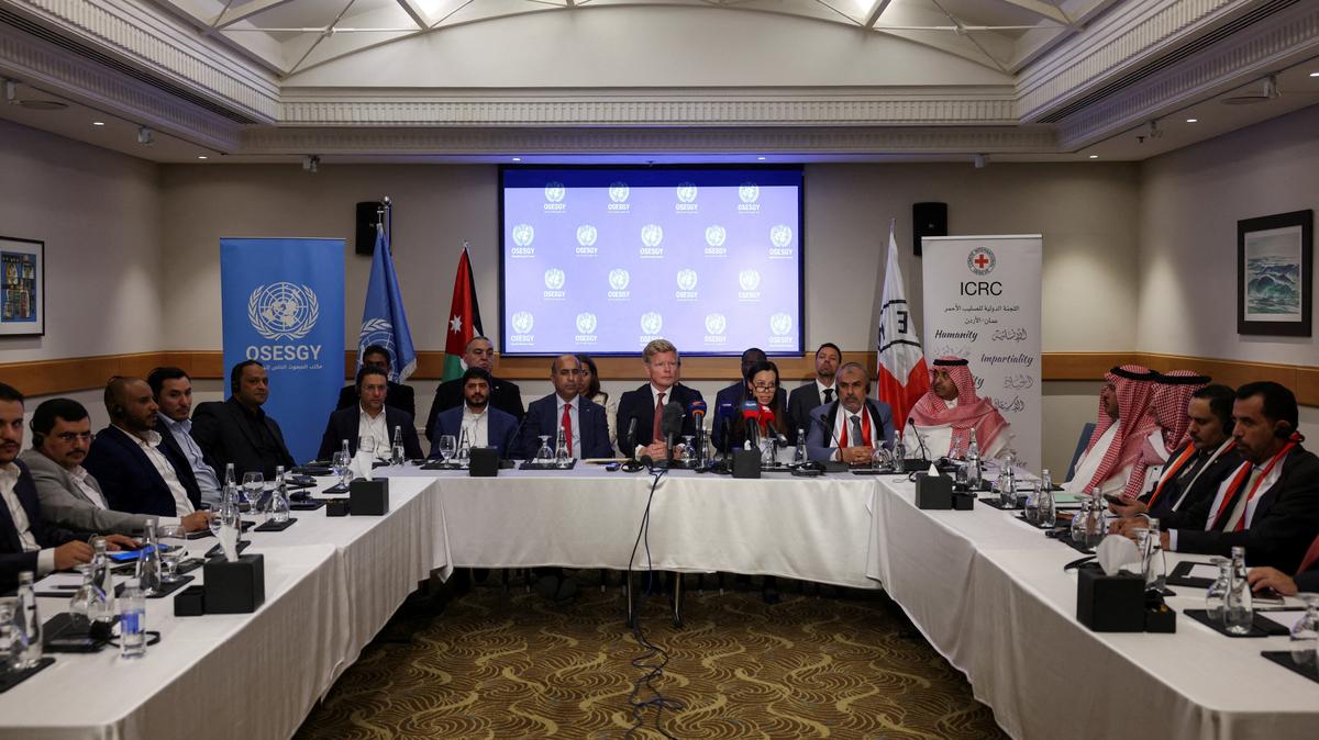 Christine Cipolla from the International Committee of the Red Cross (ICRC) speaks as she sits next to Hans Grundberg, UN Special Envoy for Yemen, as members of the Supervisory Committee on the Detainees Release Agreement attend the closing ceremony of a meeting between the Yemeni government and the Houthi group, in Amman, Jordan, May 14, 2026. REUTERS/Alaa Al Sukhni