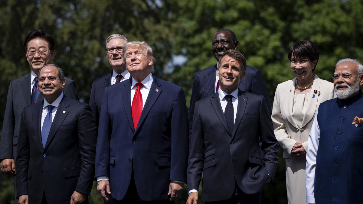 President Donald Trump stands with other world leaders during an official photo at the G7 summit in Evian-les-Bains, France, on Tuesday.
