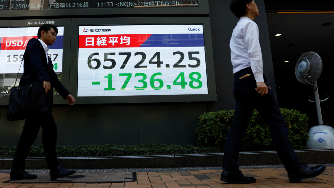 Asia stocks waver as yen surges, Iran warns of retaliation
