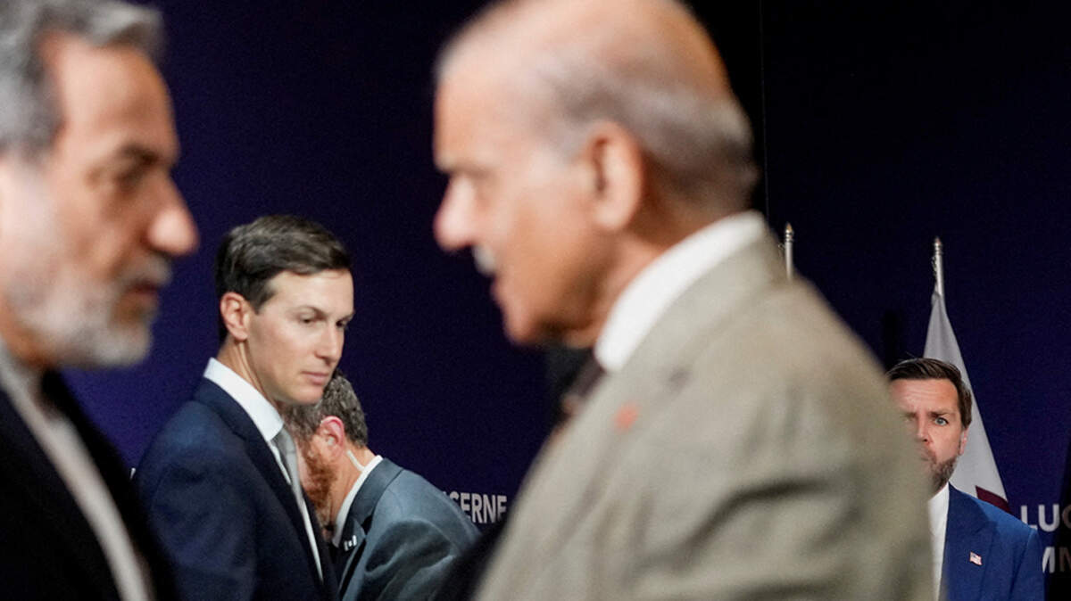 Vice President JD Vance looks on next to President Donald Trump's son-in-law Jared Kushner, as Iranian Foreign Minister Abbas Araqchi shakes hands with Pakistani Prime Minister Shehbaz Sharif, before the start of a quadrilateral meeting between the U.S., Iran, Pakistan and Qatar at the Lake Lucerne Summit at Buergenstock Resort Lake Lucerne, near Stansstad, Switzerland, on Sunday.