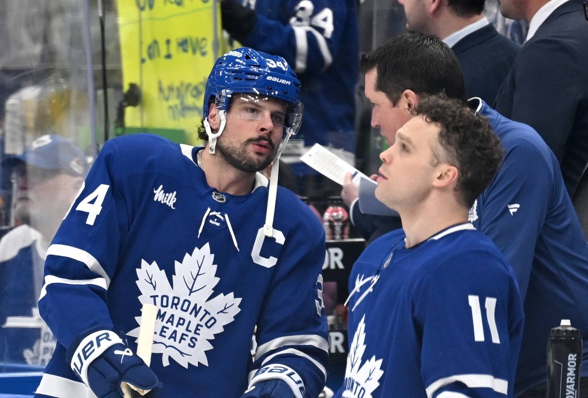  Toronto Maple Leafs forward Auston Matthews (34) speaks with forward Max Domi at Scotiabank Arena. Dan Hamilton-Imagn Images