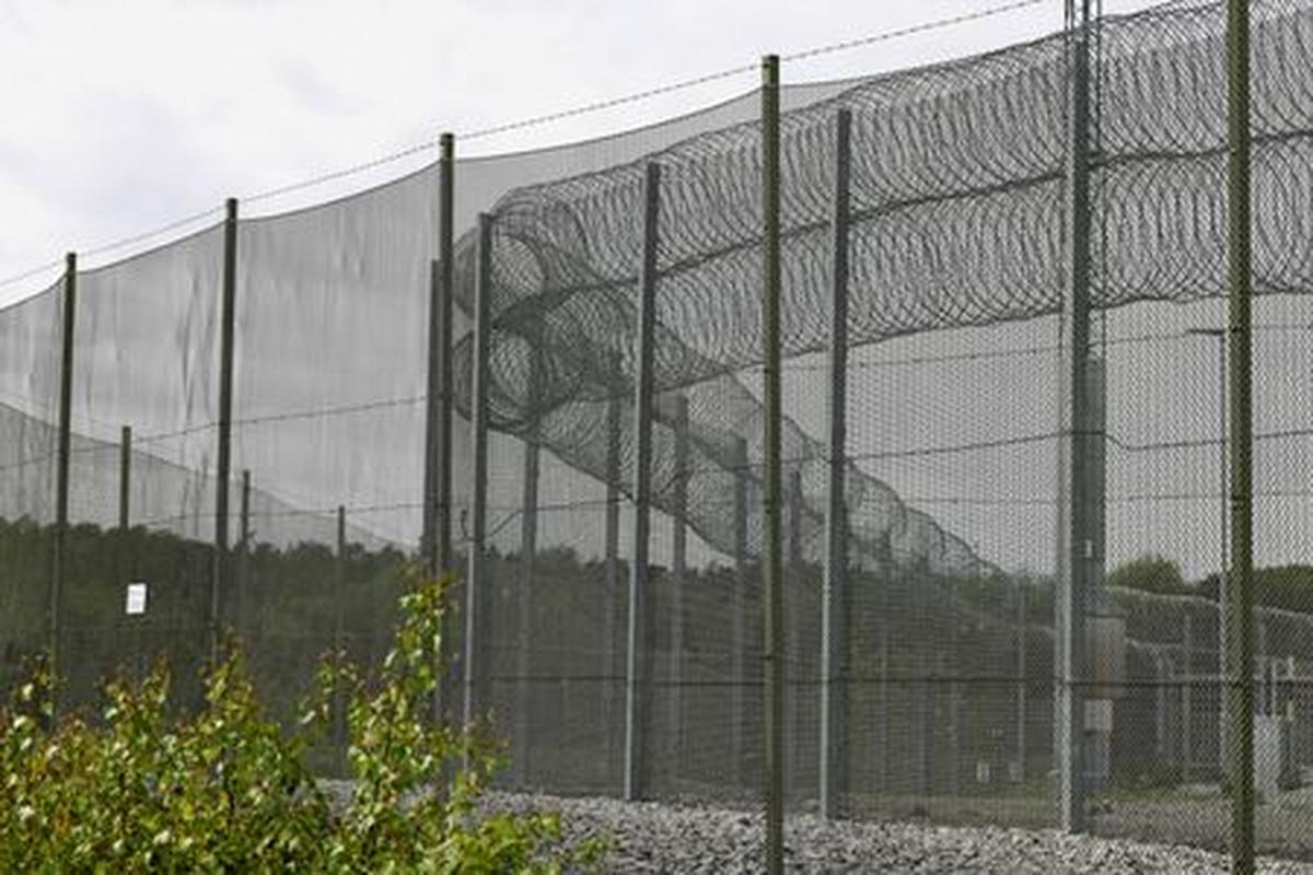 A fence surrounds Rosersberg Prison, near Stockholm, Sweden, May 25, 2026. REUTERS/Tom Little