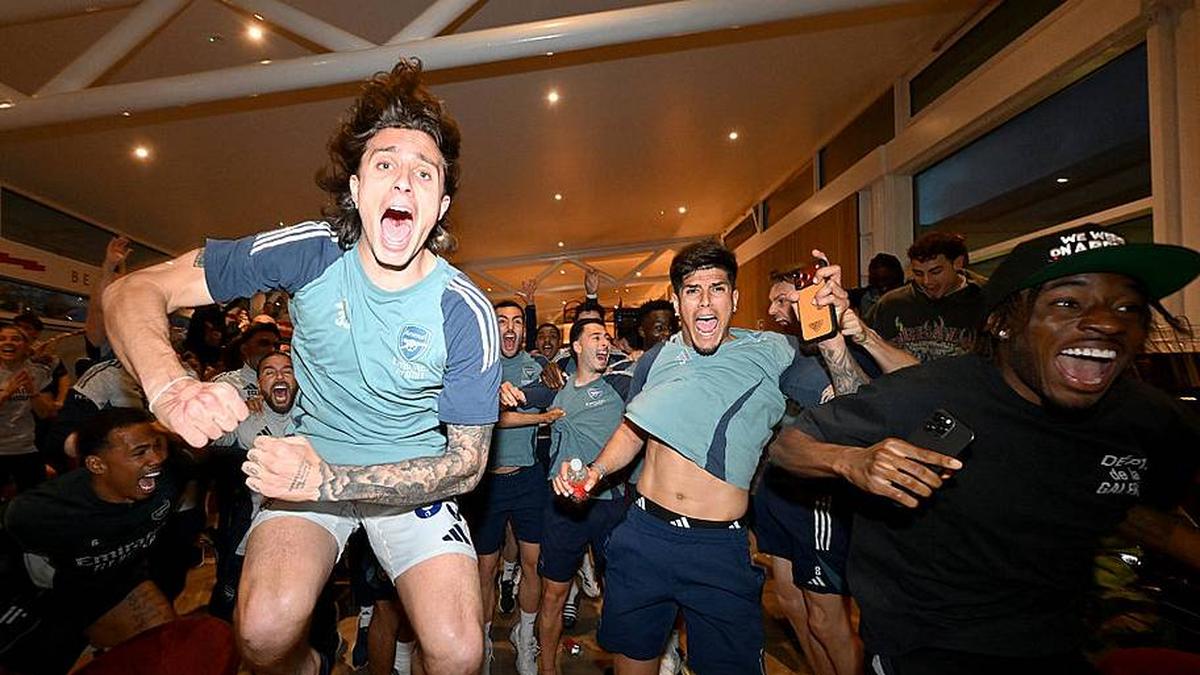  It was pure elation when Arsenal were confirmed as new Premier League champions. | Stuart MacFarlane/Arsenal FC/Getty Images 