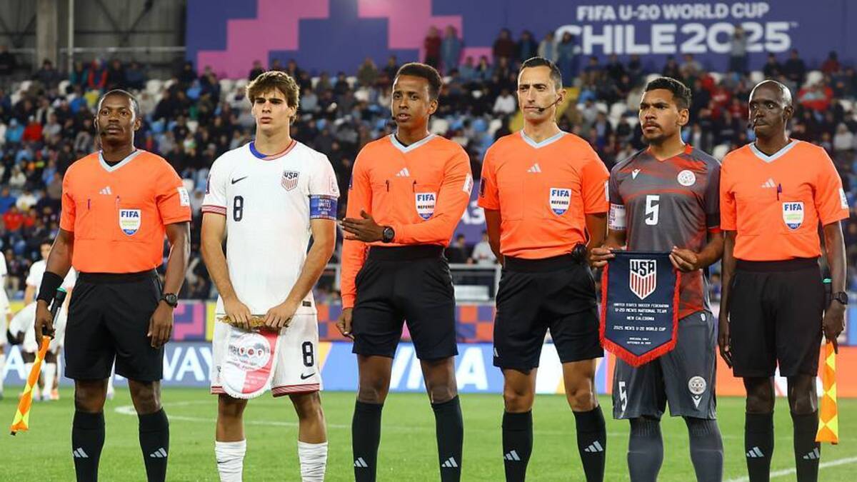  Artan (center) refereed at the 2025 FIFA U-20 World Cup in Chile. | Claudio Santana/USSF/Getty Images 