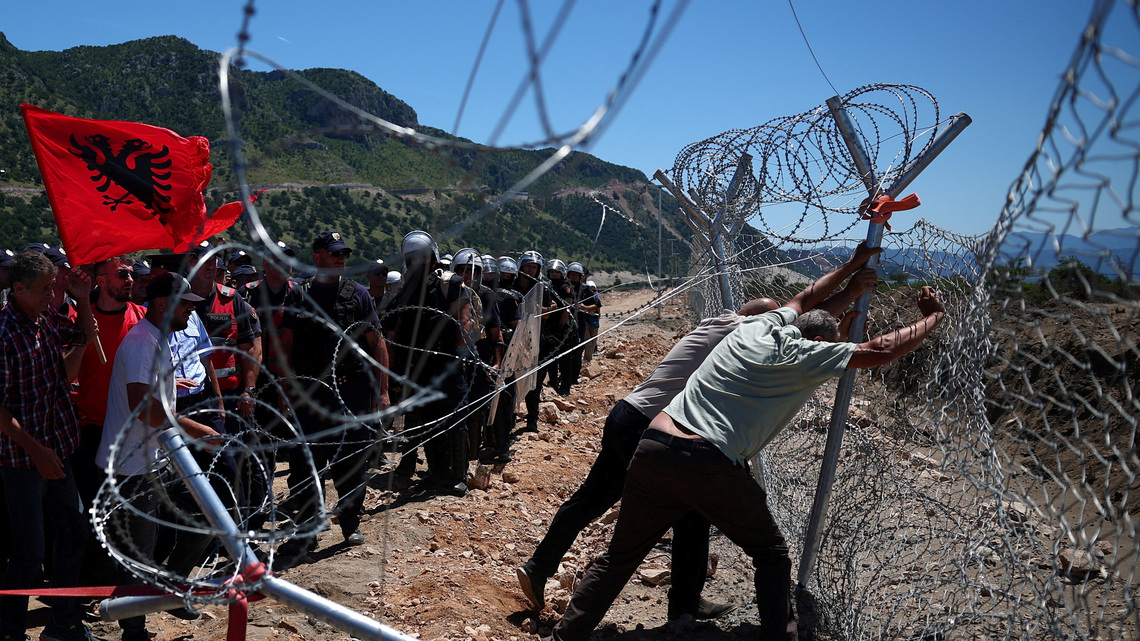 Protesters tear down Albanian development site fences, amid anger over coastal projects