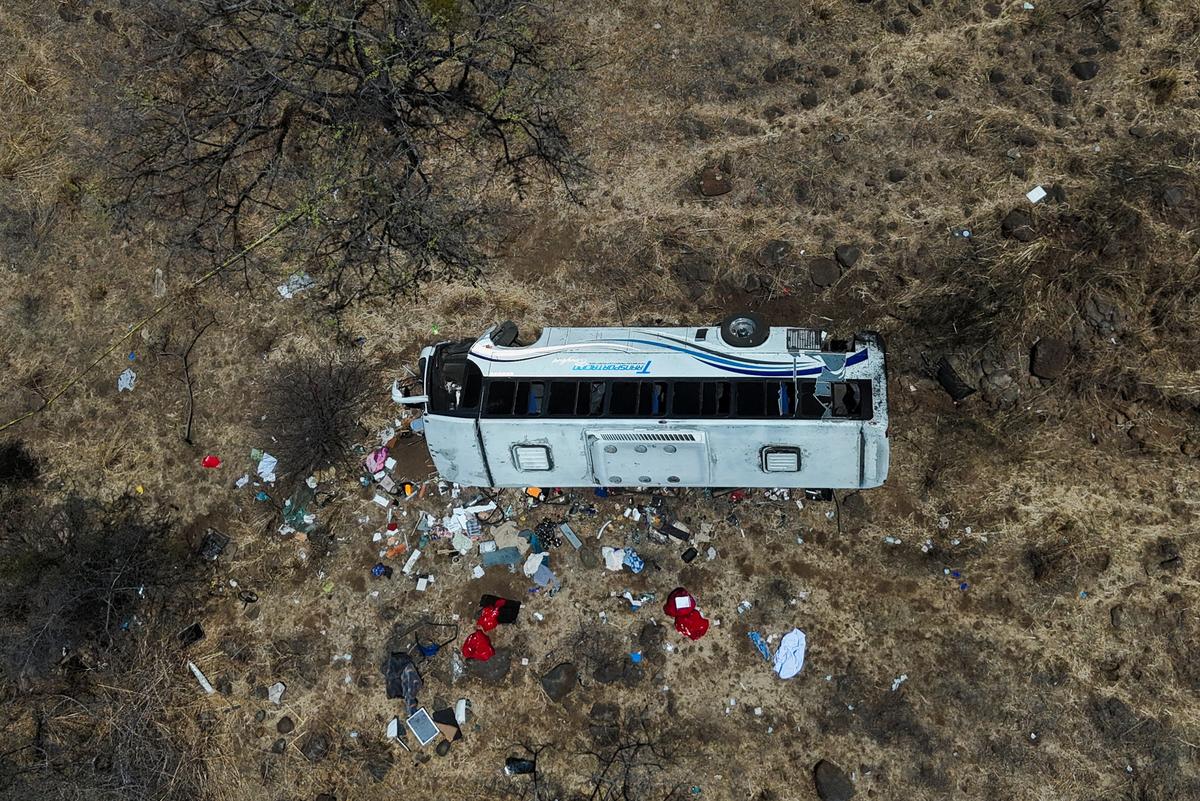 A drone view shows the belongings of passengers near the site where a tourist bus overturned, killing several people and injuring others near the town of Amatlan de Canas, in the western state of Nayarit, Mexico, May 1, 2026. REUTERS/Christian Ruano
