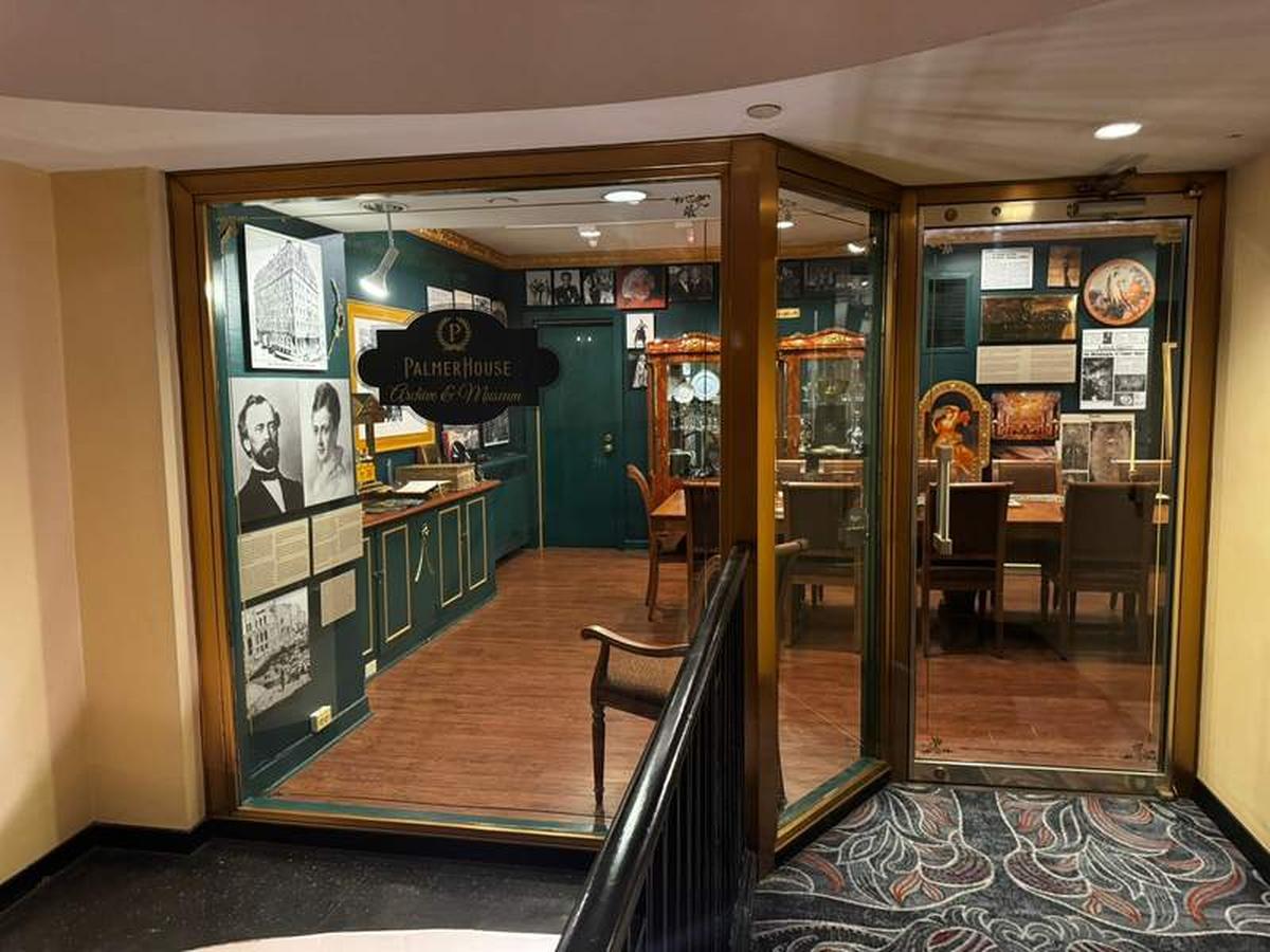  View through the window of the history museum at the Palmer House  Hilton , showcasing its curated exhibits on the hotel's rich past and Chicago's history. I was disappointed I didn't get a chance to visit here. Photo credit: Emily Molina 