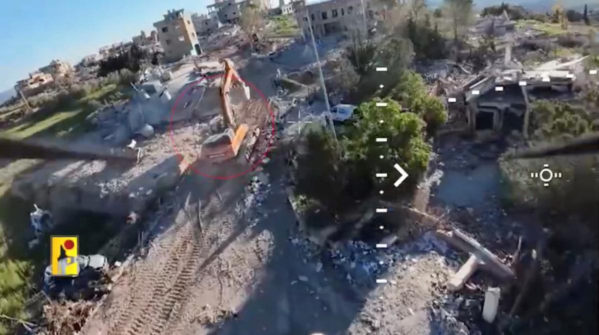 A screengrab taken from a video released by Hezbollah says to show an Israeli engineering unit moments before being hit by an FPV drone attack, in Rashaf, Lebanon, with the date of the video given as April 23, 2026.  HEZBOLLAH MILITARY MEDIA/Handout via REUTERS