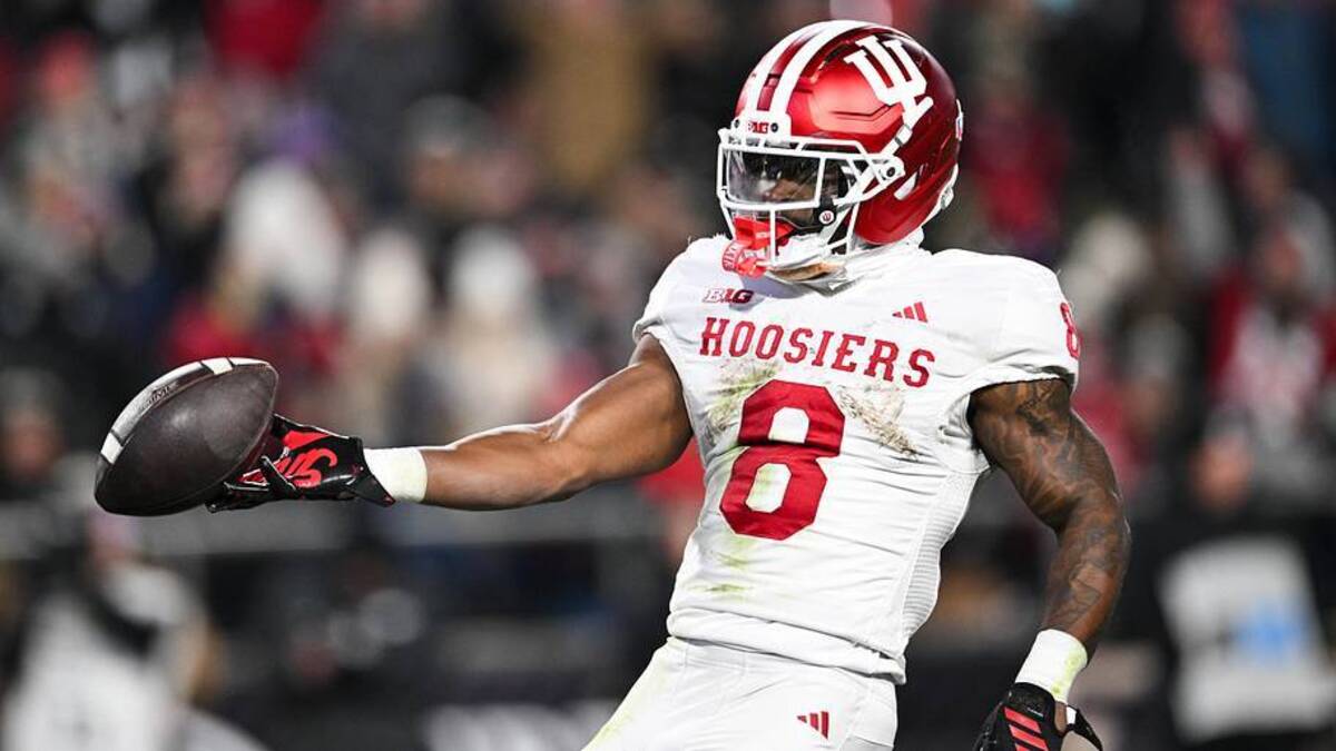 Nov 28, 2025; West Lafayette, Indiana, USA; Indiana Hoosiers running back Kaelon Black (8) celebrates after scoring a touchdown during the second quarter against the Purdue Boilermakers at Ross-Ade Stadium. Mandatory Credit: Marc Lebryk-Imagn Images | Marc Lebryk-Imagn Images 