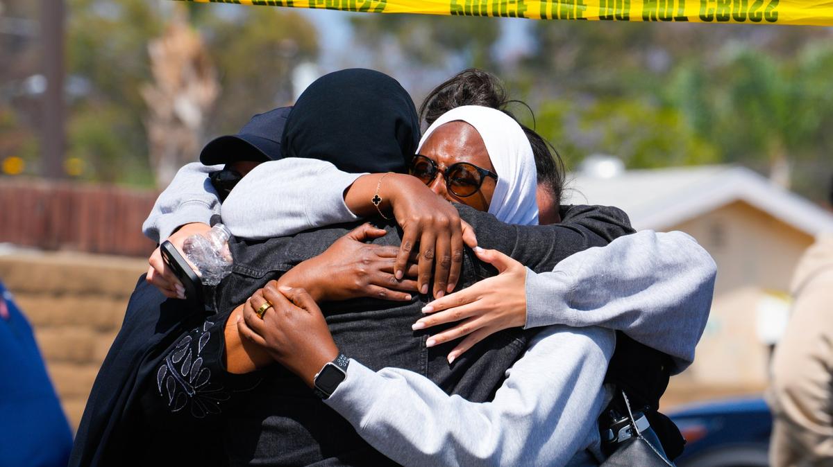 On Monday, May 18, 2026, in San Diego, not from the Islamic Center of San Diego, several people embrace one another.