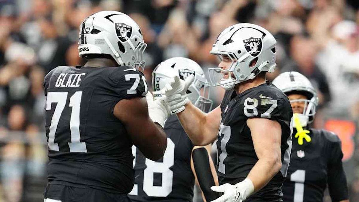  Oct 12, 2025; Paradise, Nevada, USA; Las Vegas Raiders tight end Michael Mayer (87) celebrates with Las Vegas Raiders offensive tackle DJ Glaze (71) after scoring a touch down during the second half against the Tennessee Titans at Allegiant Stadium. Mandatory Credit: Stephen R. Sylvanie-Imagn Images | Stephen R. Sylvanie-Imagn Images 