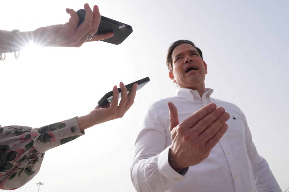 United States Secretary of State Marco Rubio speaks to the journalists before boarding his plane at Indira Gandhi International Airport in New Delhi, India, Monday, May 25, 2026.     Julia Demaree Nikhinson/Pool via REUTERS