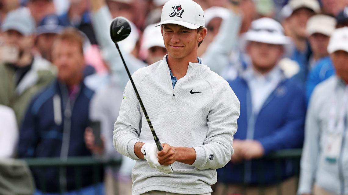 Golf-Teen Russell gets dad to caddie in US Open Father's Day gift 