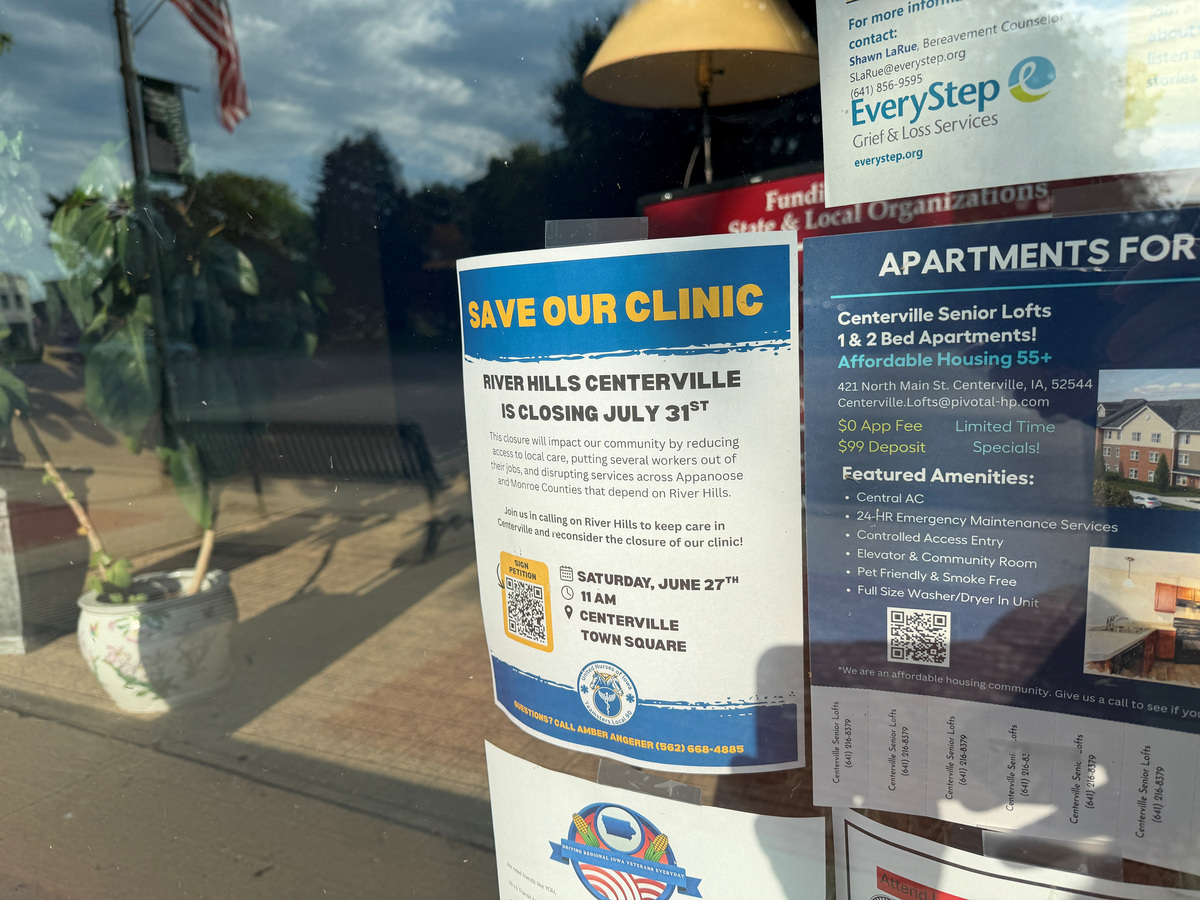 A flyer supporting efforts to save the River Hills Community Health Center is taped to a storefront in downtown Centerville, Iowa, U.S., June 24, 2026. Picture taken with a mobile phone. REUTERS/Nathan Layne