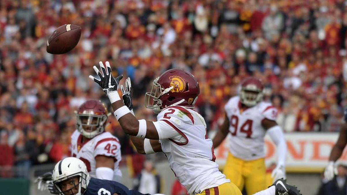  Jan 2, 2017; Pasadena, CA, USA; USC Trojans defensive back Adoree' Jackson (2) intercepts a pass intended for Penn State Nittany Lions wide receiver DeAndre Thompkins (3) the 103rd Rose Bowl against the Penn State Nittany Lions at Rose Bowl. USC defeated Penn State 52-49 in the highest scoring game in Rose Bowl history. Mandatory Credit: Kirby Lee-Imagn Images | Kirby Lee-Imagn Images 