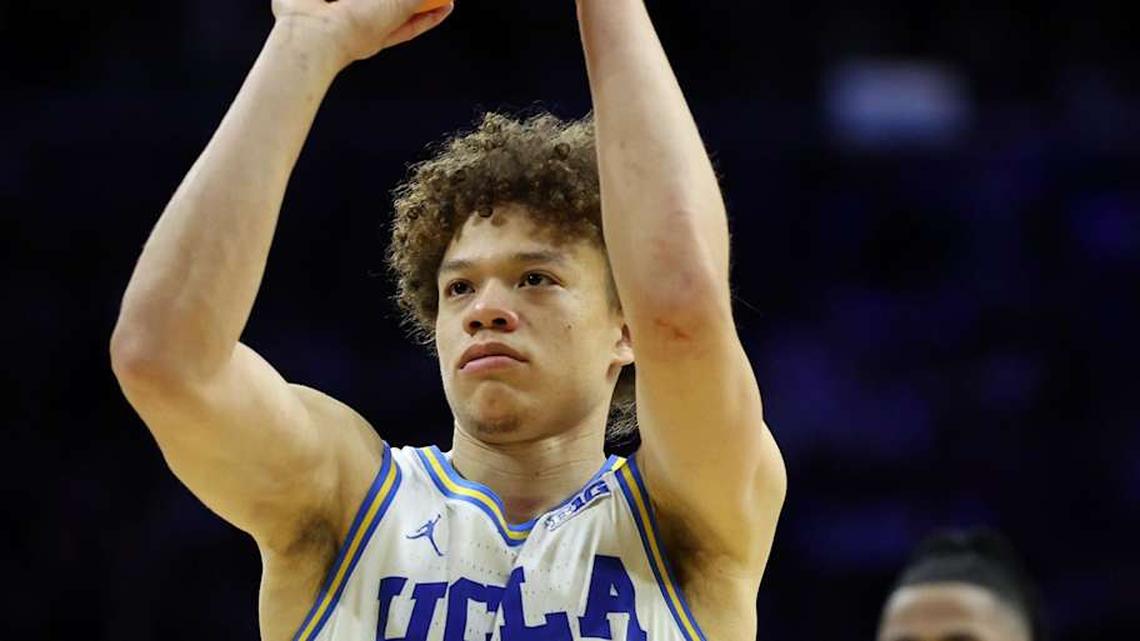  Mar 20, 2026; Philadelphia, PA, USA; UCLA Bruins guard Trent Perry (0) shoots the ball in the second half during a first round game of the men's 2026 NCAA Tournament at Xfinity Mobile Arena. Mandatory Credit: Bill Streicher-Imagn Images | Bill Streicher-Imagn Images 