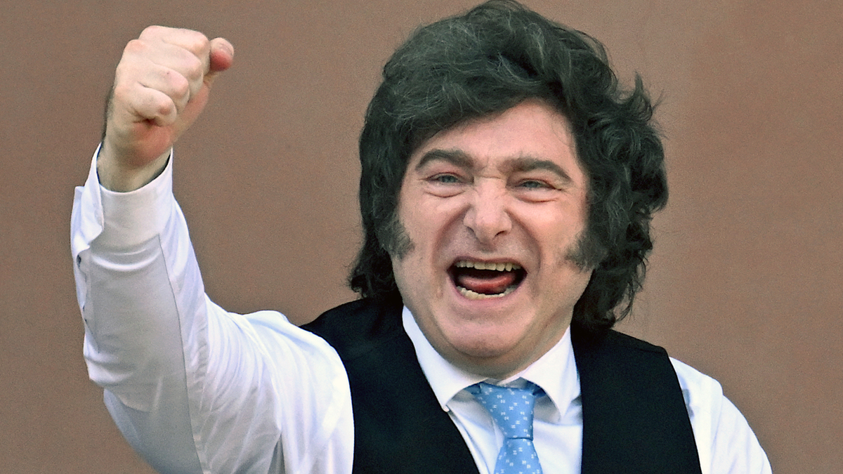 Argentina's President Javier Milei gestures from the balcony of Casa Rosada presidential palace after a Te Deum marking the 216th anniversary of the May Revolution that led to Argentina's independence from Spain, in Buenos Aires on May 25, 2026. (Luis Robayo/AFP/Getty Images/TNS)