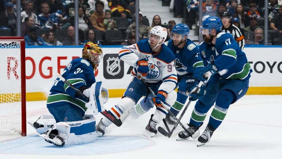 Canucks eager to fix defensive problems as Flames visit 