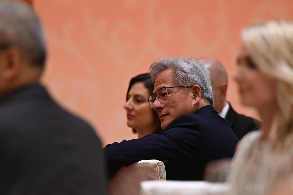 Jensen Huang, the chief executive of Nvidia, attends a state banquet during the summit between President Donald Trump and President Xi Jinping of China, at the Great Hall of the People in Beijing on Thursday, May 14, 2026. During the first U.S. presidential visit to China in nearly a decade, Xi delivered a warning on Taiwan, saying that the issue, if handled poorly, could lead to conflict and "an extremely dangerous situation." (Kenny Holston/The New York Times)..