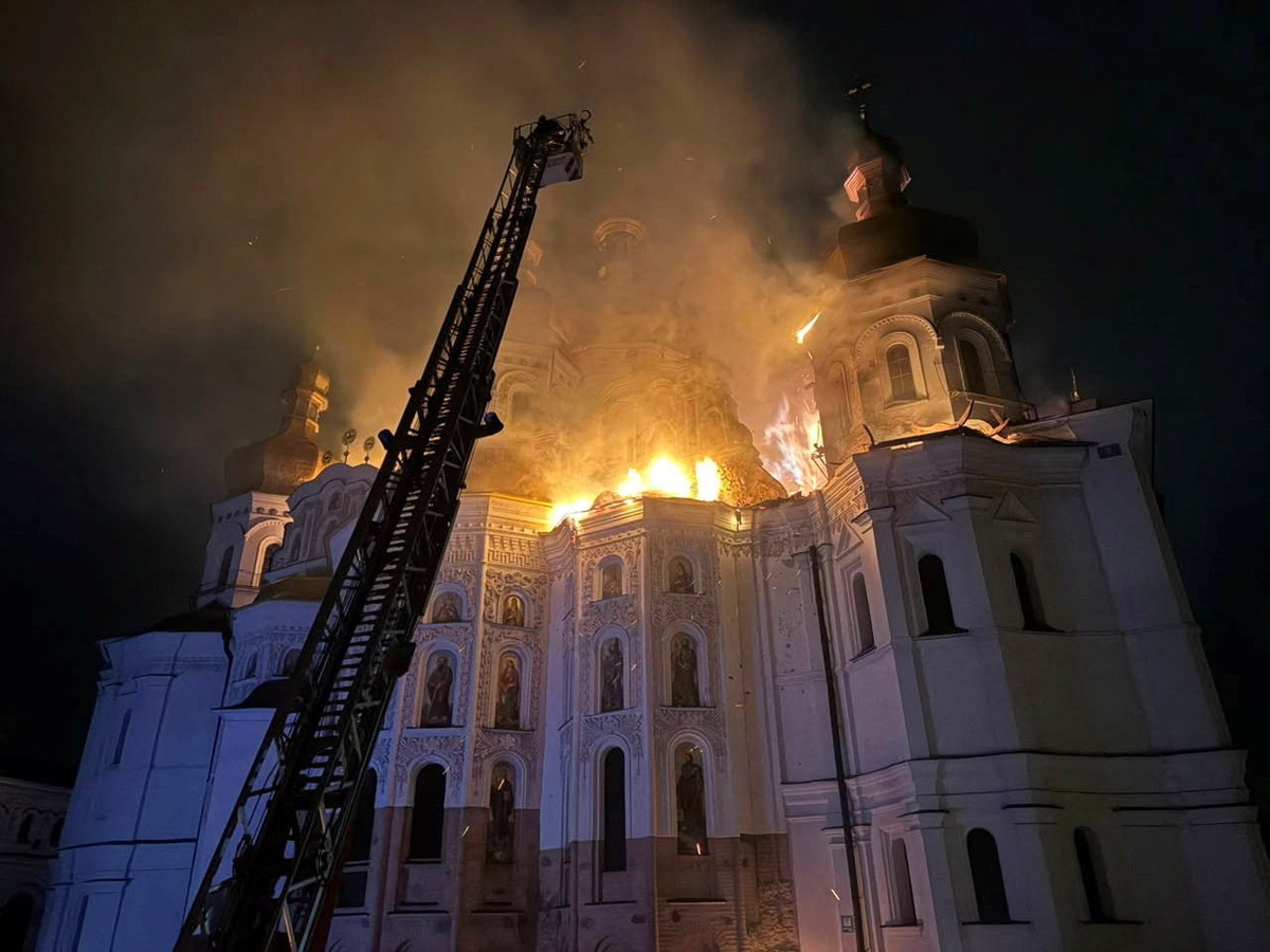 Firefighters work at a site of the Dormition Cathedral of the Kyiv Pechersk Lavra monastery, which burns after it was hit during Russian missile and drone strikes, amid Russia's attack on Ukraine, in Kyiv, Ukraine June 15, 2026. Minister of Culture of Ukraine Tetyana Berezhna via Facebook/Handout via REUTERS