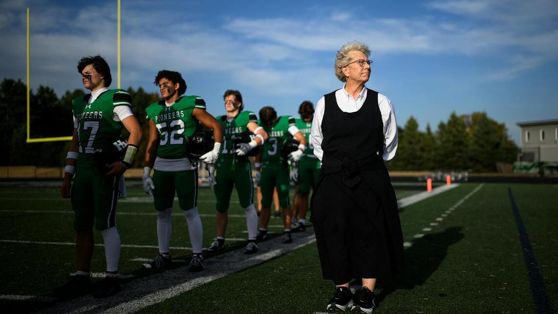 Sister Linda Soler is the spiritual leader, and loudest cheerleader, for school's football team