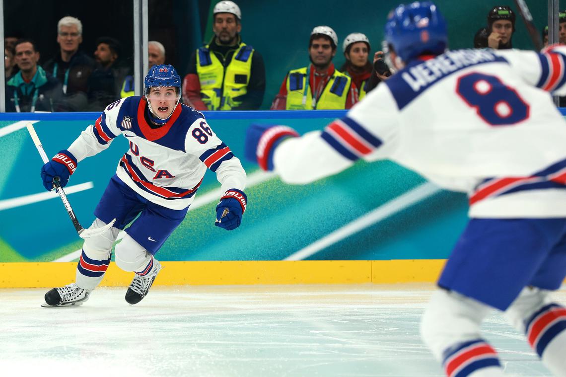  MILAN, ITALY – FEBRUARY 22: Jack Hughes of Team United States celebrates scoring the game-winning goal in overtime during the Men's Gold Medal match between Canada and the United States on day 16 of the Milano Cortina 2026 Winter Olympic games at Milano Santagiulia Ice Hockey Arena on February 22, 2026 in Milan, Italy.Elsa/Getty Images 