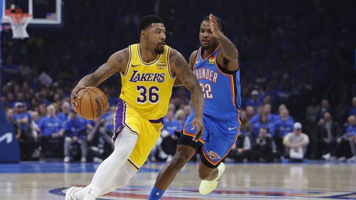  May 5, 2026; Oklahoma City, Oklahoma, USA; Los Angeles Lakers guard Marcus Smart (36) moves the ball around Oklahoma City Thunder guard Cason Wallace (22) in the first half during game one of the second round of the 2026 NBA Playoffs at Paycom Center. Mandatory Credit: Alonzo Adams-Imagn Images | Alonzo Adams-Imagn Images 