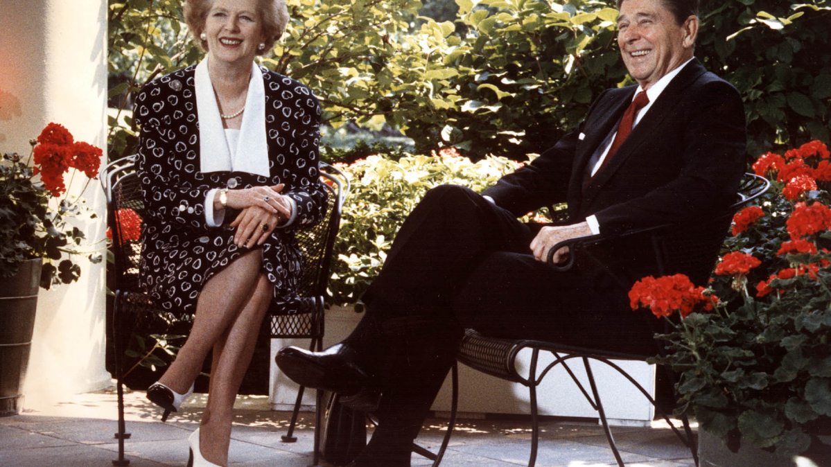 This July 17, 1987, file photo shows former US President Ronald Reagan and former British Prime Minister Margaret Thatcher as they pose for photographers on the patio outside the Oval Office in Washington, D.C. (Mike Sargent/AFP via Getty Images/TNS)