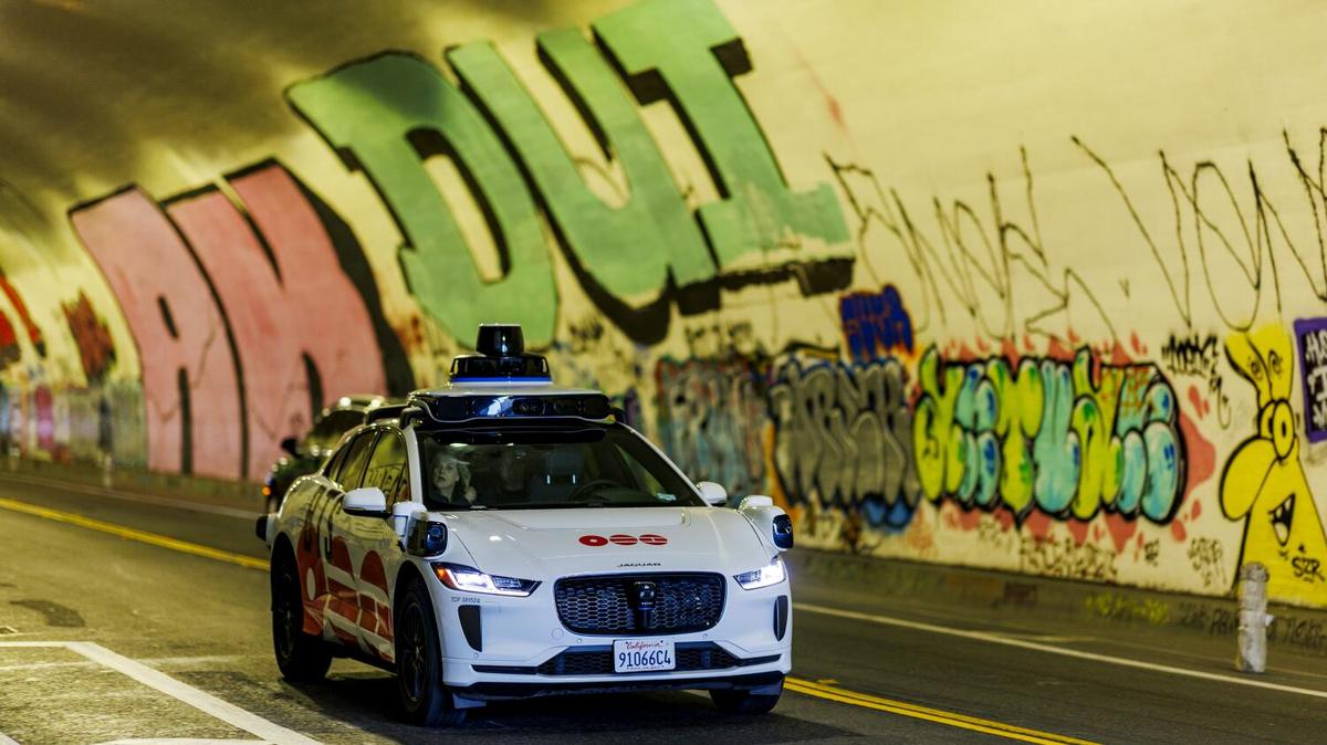 An autonomous Waymo all-electric Jaguar I-PACE SUV drives a passenger through the 2nd Street tunnel on April 22, 2026, in Los Angeles, California. (Gina Ferazzi/Los Angeles Times/TNS)