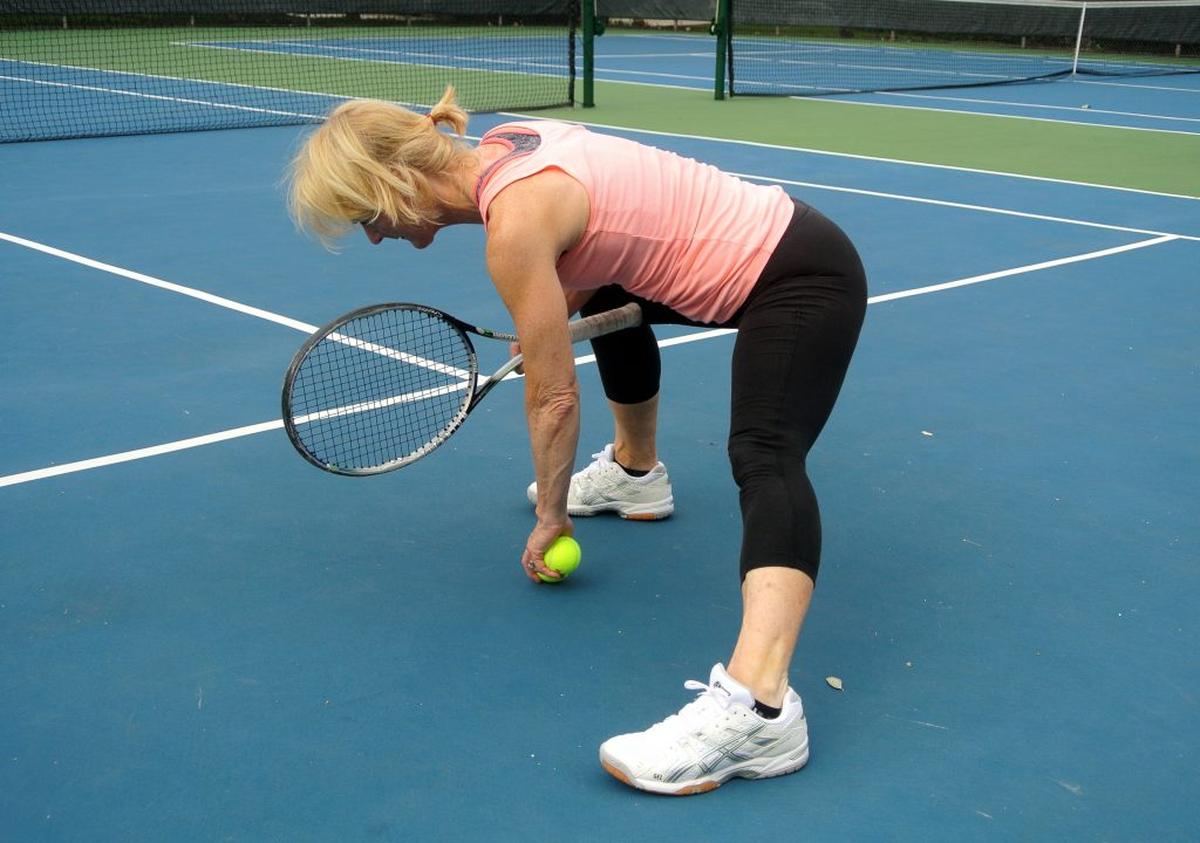  A woman stretches before starting tennis match. (American Heart Association via SWNS) 