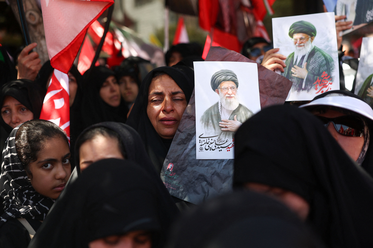 Mourners attend the burial ceremony for Iran's late Supreme Leader Ayatollah Ali Khamenei, who was killed on February 28 in Israeli and U.S. airstrikes, in Mashhad, Iran, July 9, 2026.  Majid Asgaripour/WANA (West Asia News Agency) via REUTERS