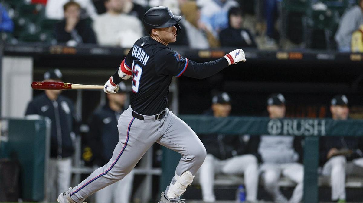 May 10, 2025; Chicago, Illinois, USA; Miami Marlins first baseman Eric Wagaman (33) hits a two-run triple against the Chicago White Sox during the eight inning at Rate Field. Mandatory Credit: Kamil Krzaczynski-Imagn Images