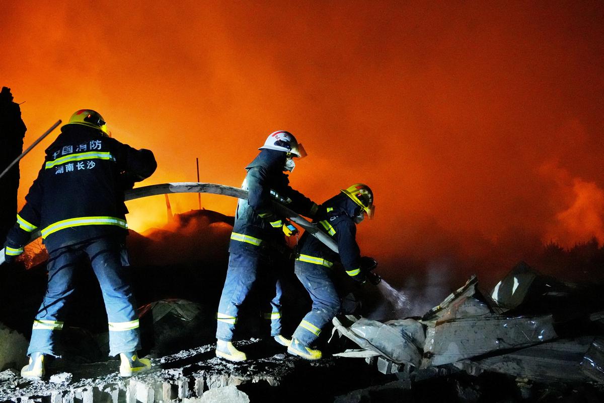 Firefighters work to extinguish a fire following a blast at a fireworks manufacturing factory in Liuyang, Hunan province, China, May 5, 2026. cnsphoto via REUTERS