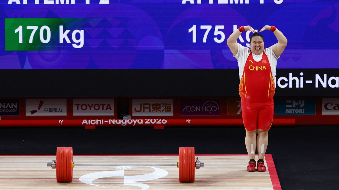 Games-Olympic champion Li accomplishes gold mission, heartbreak for Iraq's Ammar 
