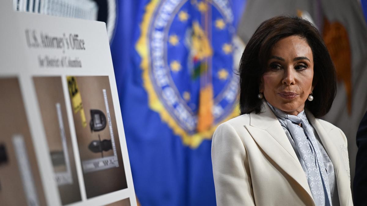 US-POLITICS-TRUMP-SHOOTING. US Attorney for the District of Columbia Jeanine Pirro looks on during a news conference at Department of Justice headquarters in Washington, DC, on April 27, 2026. 