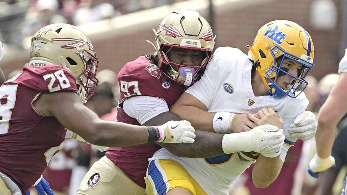  Oct 11, 2025; Tallahassee, Florida, USA; Florida State Seminoles defensive lineman Mandrell Desir (93) sacks Pittsburgh Panthers quarterback Mason Heintschel (6) during the first half at Doak S. Campbell Stadium. Mandatory Credit: Melina Myers-Imagn Images | Melina Myers-Imagn Images 