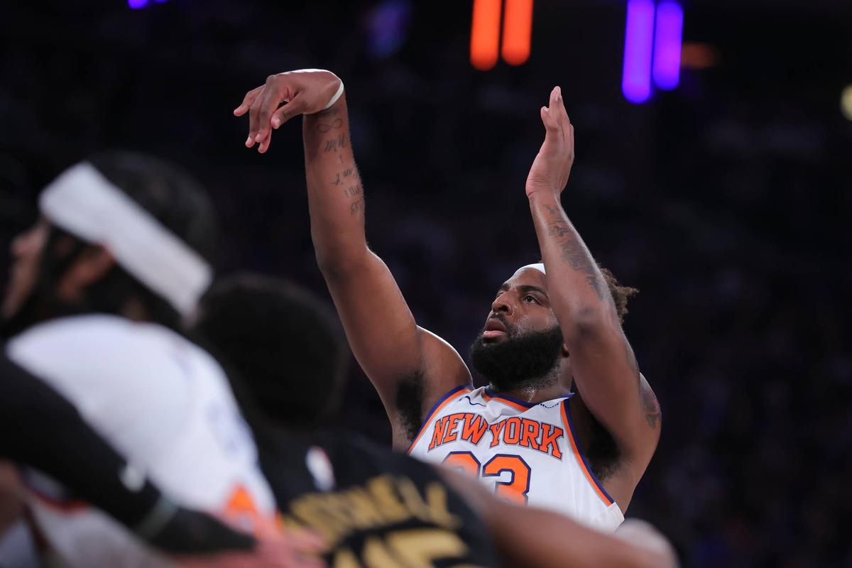  May 19, 2026; New York, New York, USA; New York Knicks center Mitchell Robinson (23) shoots a free throw against the Cleveland Cavaliers during the third quarter of game one of the eastern conference finals during the 2026 NBA playoffs at Madison Square Garden. Mandatory Credit: Brad Penner-Imagn Images 