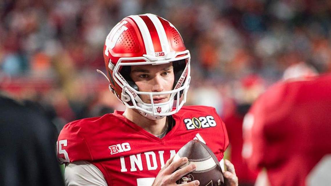  Indiana's Fernando Mendoza (15) gets loose before the College Football Playoff National Championship college football game at Hard Rock Stadium in Miami Gardens on Monday, Jan. 19, 2026. | Rich Janzaruk/Herald-Times / USA TODAY NETWORK via Imagn Images 