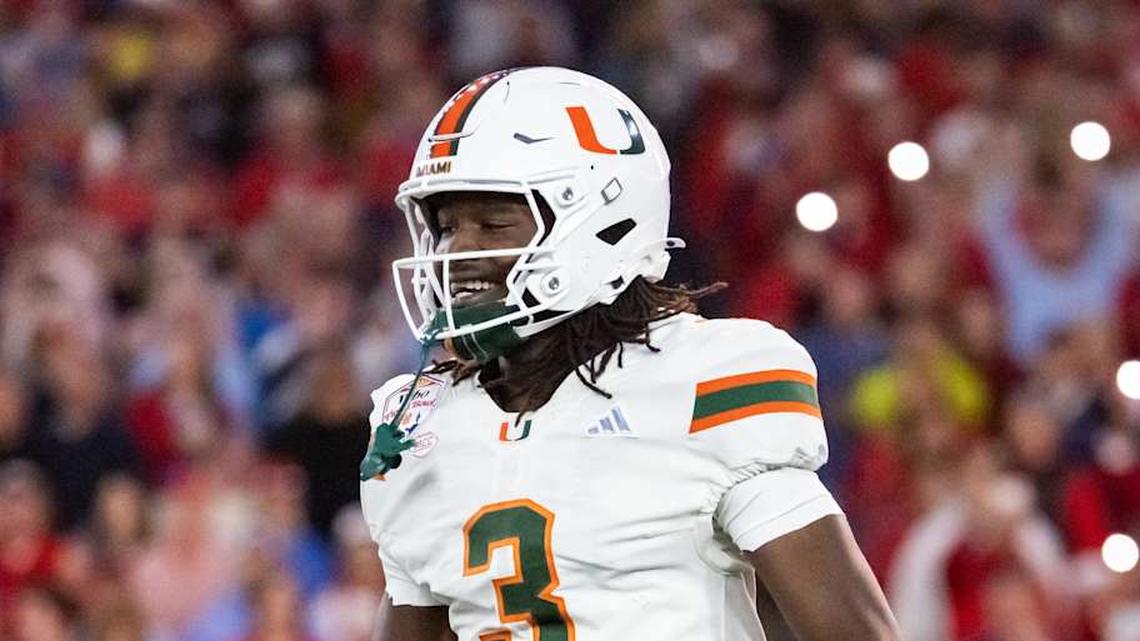  Jan 8, 2026; Glendale, AZ, USA; Miami Hurricanes wide receiver Joshua Moore (3) against the Mississippi Rebels during the 2026 Fiesta Bowl and semifinal game of the College Football Playoff at State Farm Stadium. Mandatory Credit: Mark J. Rebilas-Imagn Images | Mark J. Rebilas-Imagn Images 