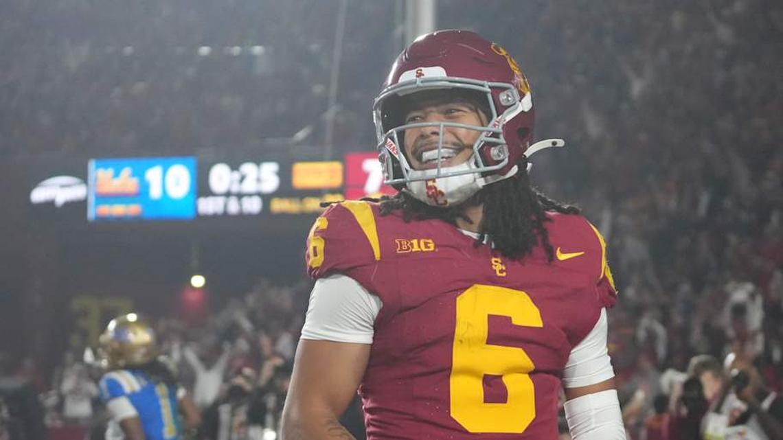  Nov 29, 2025; Los Angeles, California, USA; Southern California Trojans wide receiver Makai Lemon (6) celebrates after catching a 32-yard touchdown pass against the UCLA Bruins in the second half at United Airlines Field at Los Angeles Memorial Coliseum. Mandatory Credit: Kirby Lee-Imagn Images | Kirby Lee-Imagn Images 