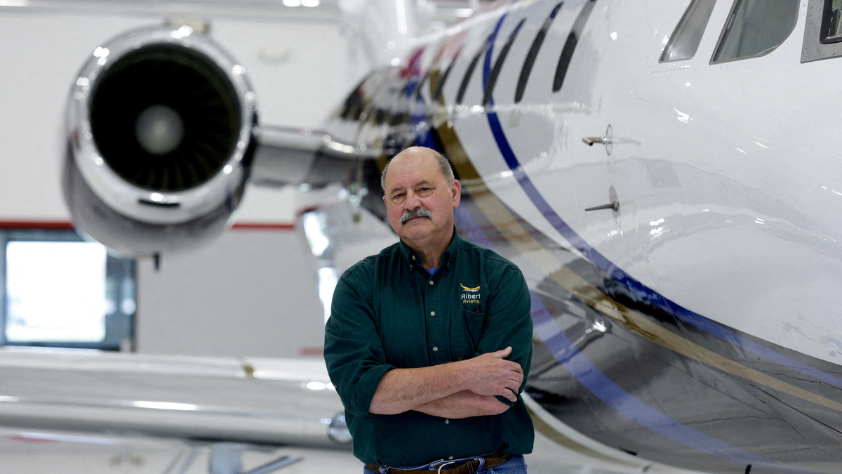 FILE PHOTO: Pilot Terry Alberta poses for a portrait at the West Michigan Regional Airport, in Holland, Michigan, U.S., May 9, 2025. REUTERS/Kristen Norman/File Photo