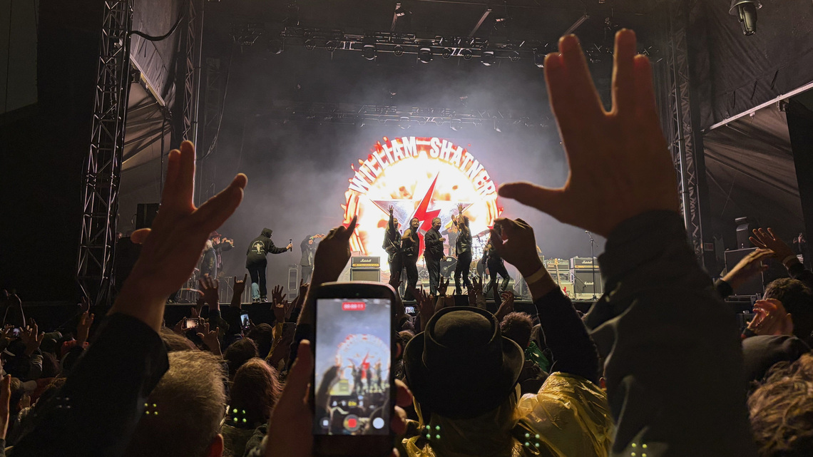 William Shatner covers 'Crazy Train' at mud-soaked Riot Fest 