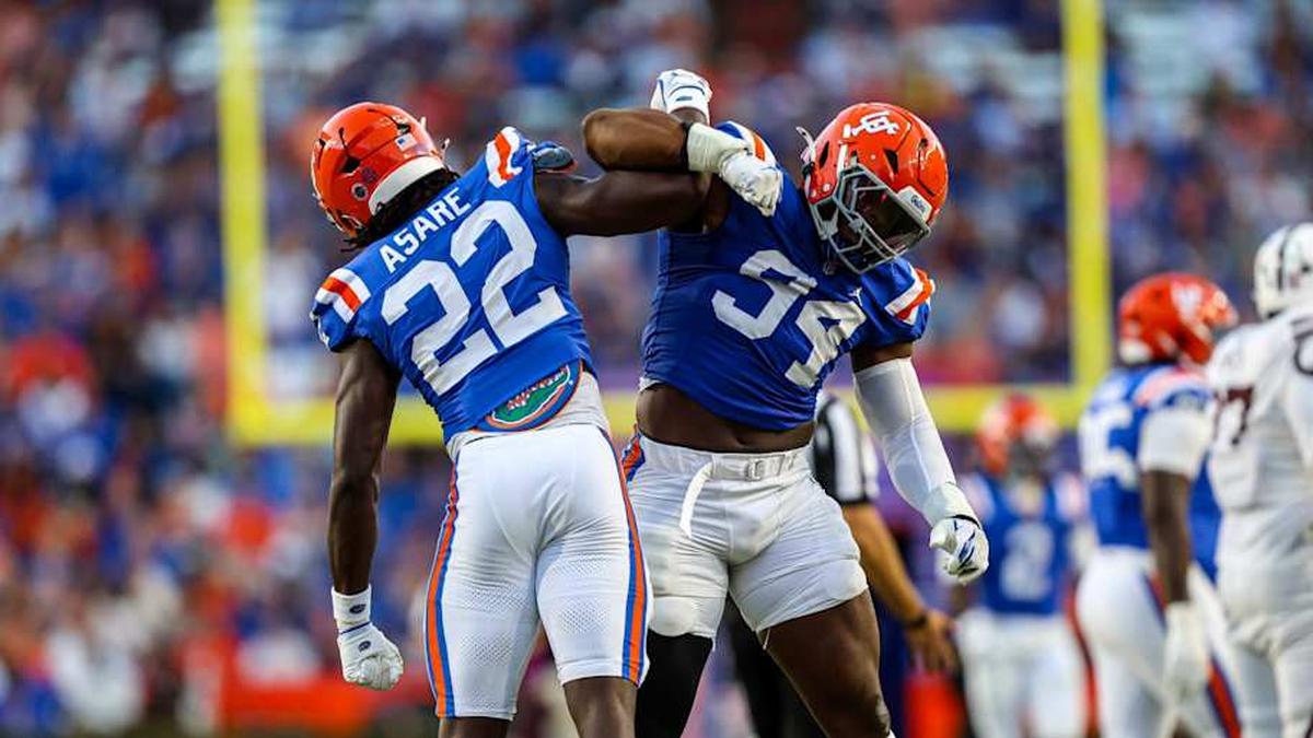 Kofi Asare and Tyreak Sapp celebrate a sack during the Florida Gators' win over Mississippi State. 