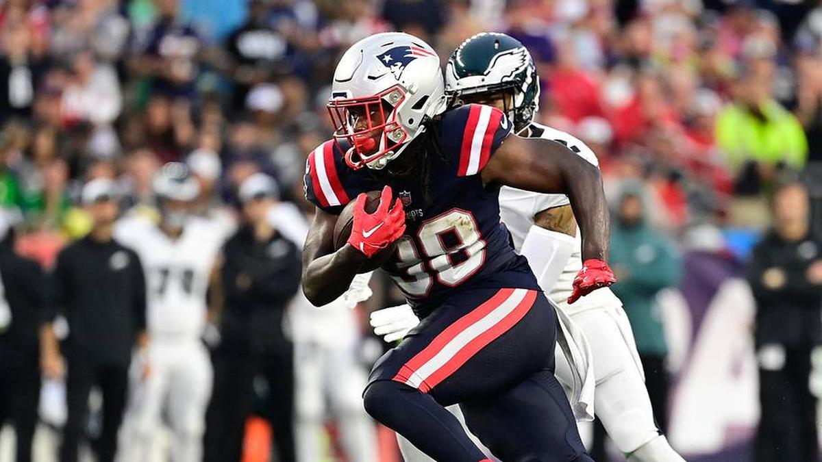  Sep 10, 2023; Foxborough, Massachusetts, USA; New England Patriots running back Rhamondre Stevenson (38) runs the ball against the Philadelphia Eagles during the second half at Gillette Stadium. Mandatory Credit: Eric Canha-Imagn Images | Eric Canha-Imagn Images 