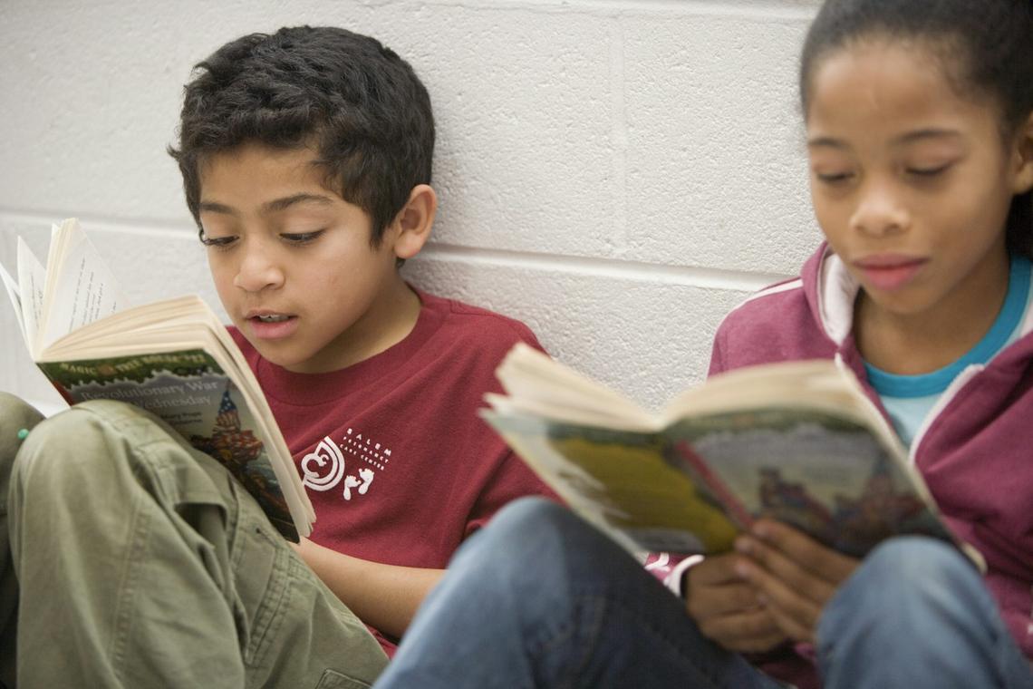  Reading scores are improving in some states, but the progress is not consistent. Will & Deni McIntyre/Corbis Documentary 