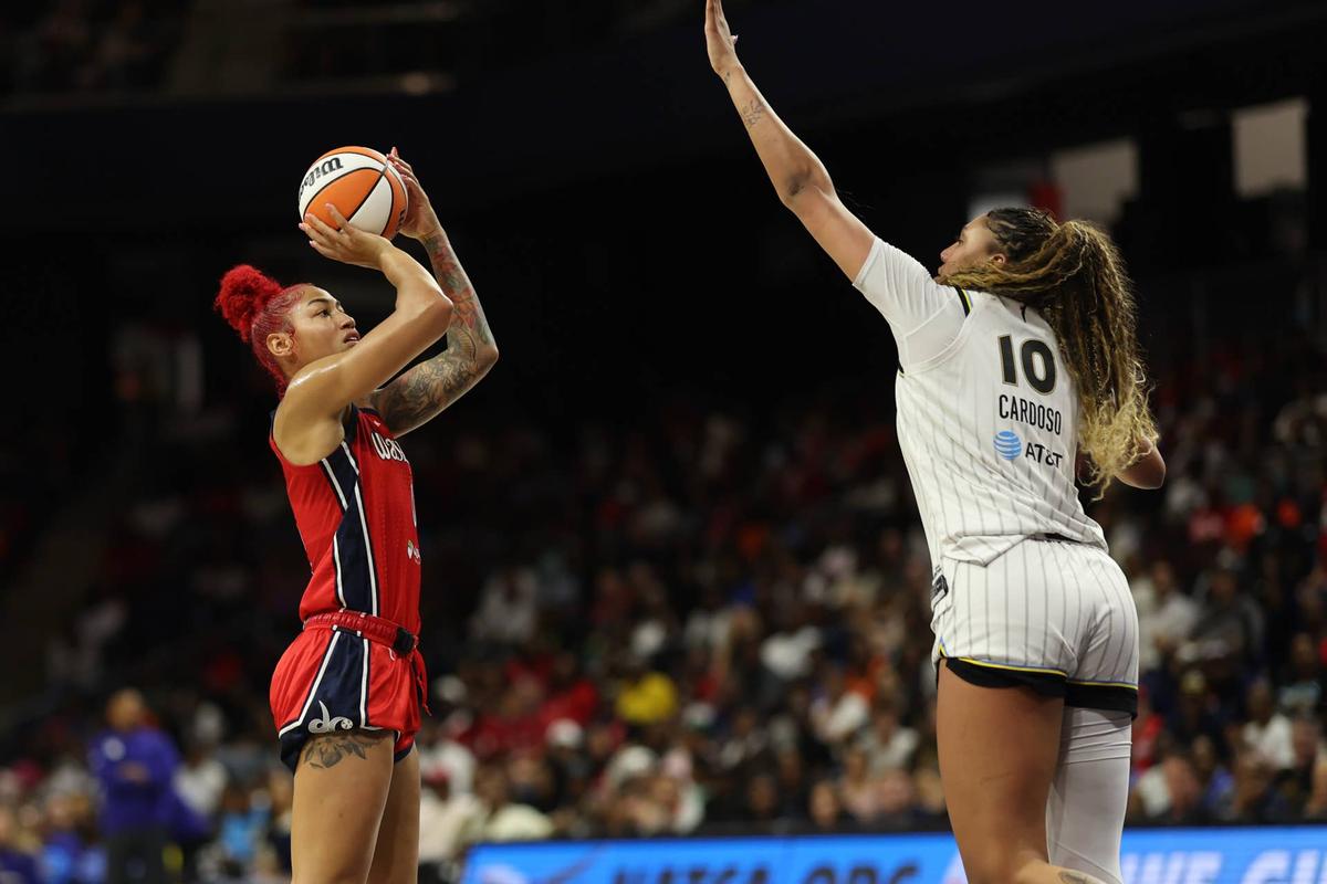  Washington Mystics forward Shakira Austin (0) shoots the ball over Chicago Sky center Kamilla Cardoso (10) Geoff Burke-Imagn Images