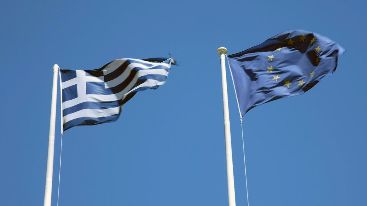 A Euro flag flaps next to a Greek flag on the day "New Democracy" leader Antonis Samaras is forming a new government in Athens Greece,on Wednesday June 20,2012.Mr.Samaras's is today meeting leaders from other parties to form a coalition government. UPI/Hugo Philpott