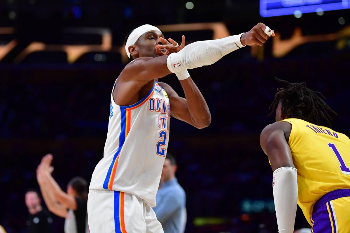  Oklahoma City Thunder guard Shai Gilgeous-Alexander reacts after scoring three point basket against the Los Angeles Lakers. Gary A. Vasquez-Imagn Images