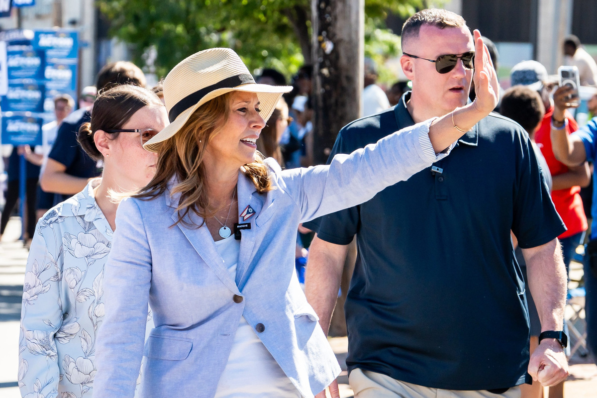 Amy Acton greets attendees of of the 54th annual 11th Congressional District Community Caucus Labor Day Parade and Festival on Sept. 7  in Cleveland.