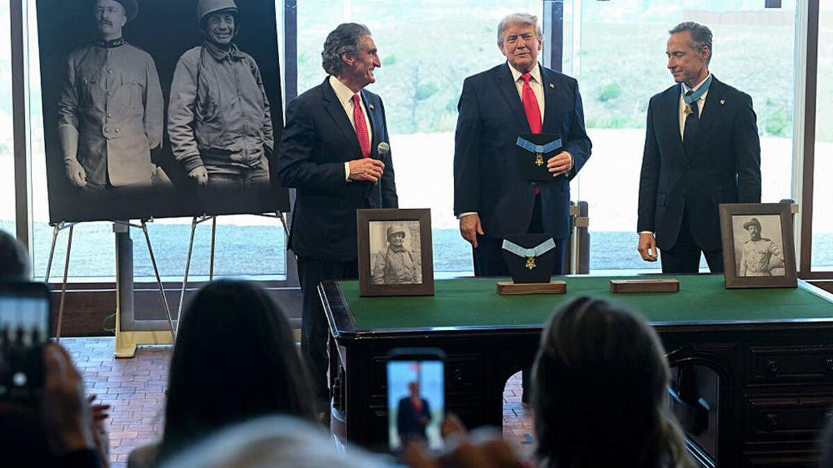 From left, Interior Secretary speaks as President Donald Trump and President of the Congressional Medal of Honor Society Britt K. Slabinski look on during a ceremony at the newly opened Theodore Roosevelt Presidential Library in Medora, North Dakota, on Wednesday. Trump donated the 26th president’s Medal of Honor, which was displayed in the Roosevelt Room of the White House, to the library.